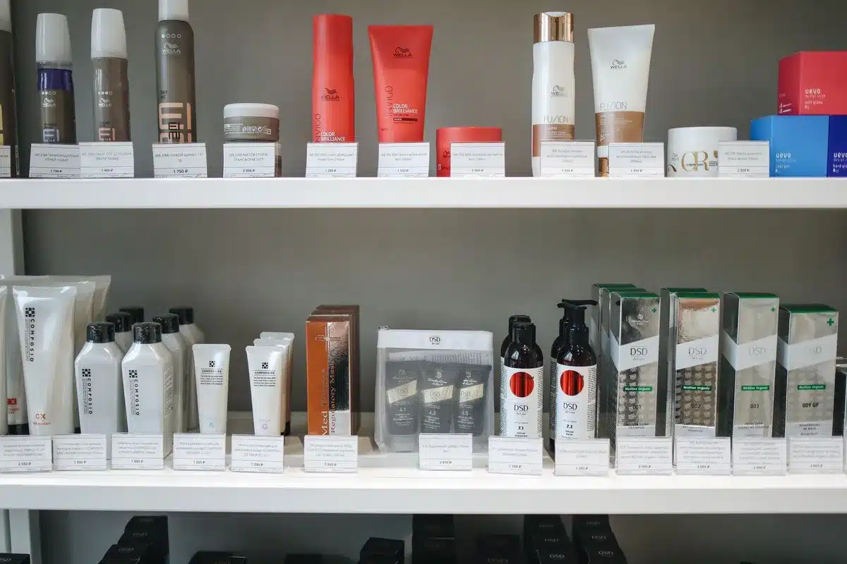 Neatly arranged skincare and beauty products on shelves, highlighting options for your first facial spa visit.